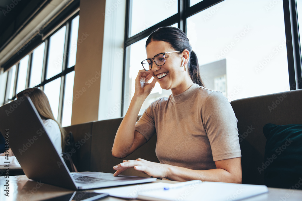 Woman on video call on laptop