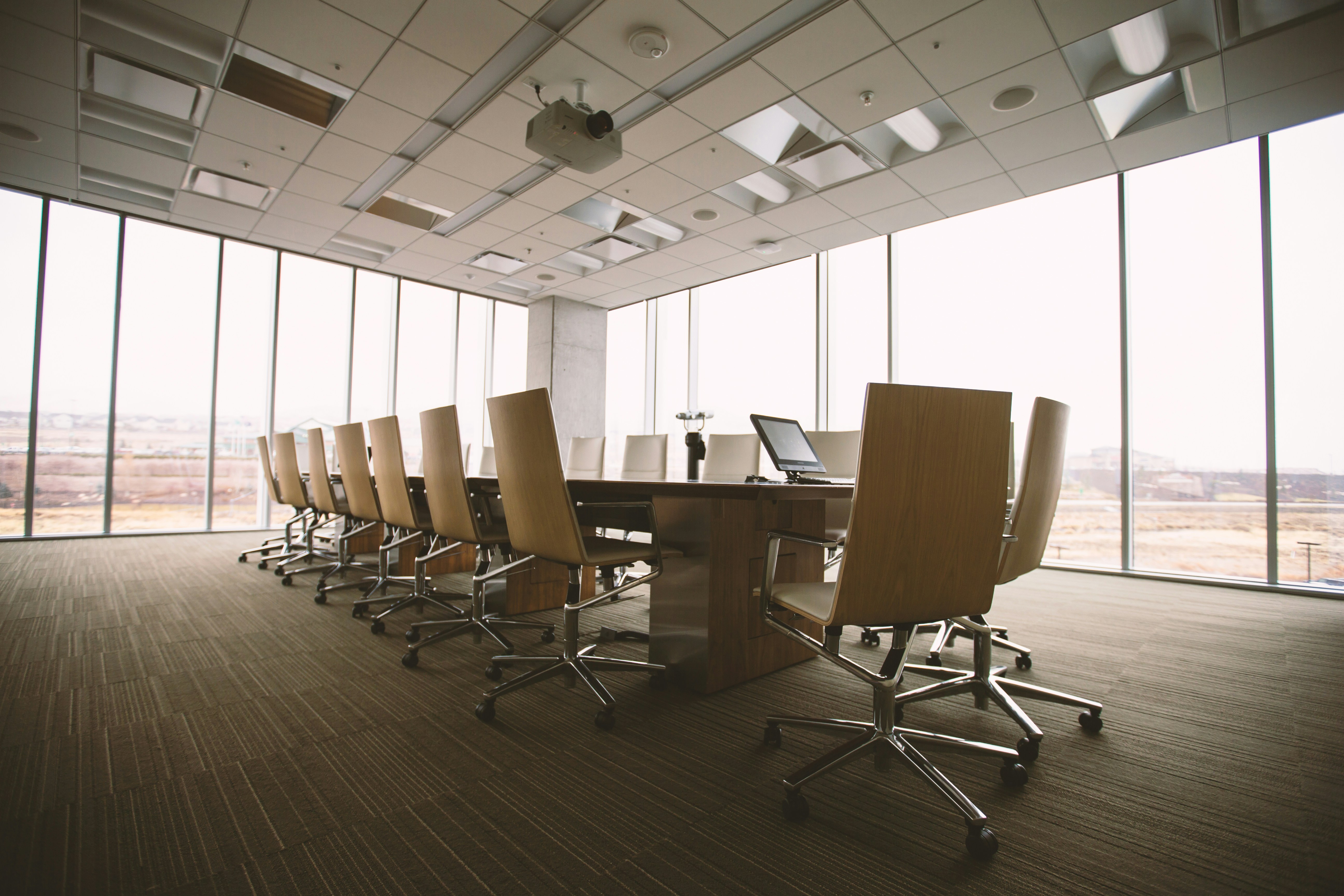 Large empty meeting room with large glass windows